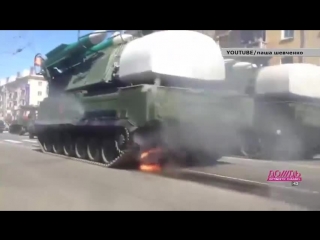 a buk caught fire at the victory parade in chita. video